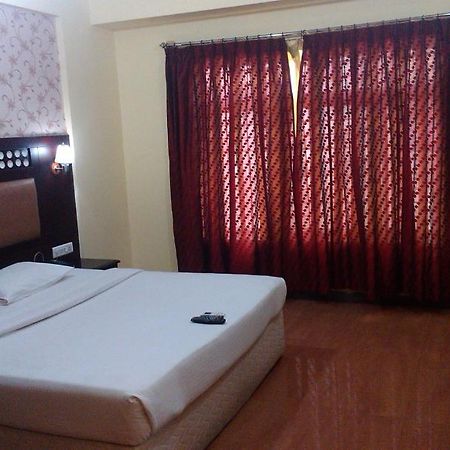 Solitaire Suites Μπανγκαλόρ Δωμάτιο φωτογραφία