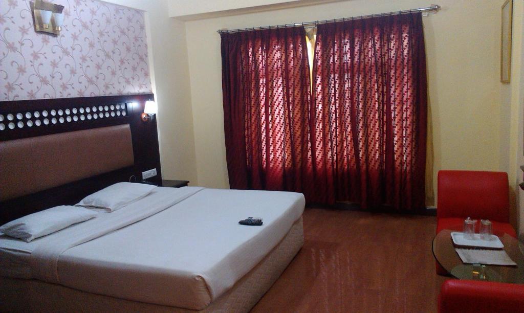 Solitaire Suites Μπανγκαλόρ Δωμάτιο φωτογραφία